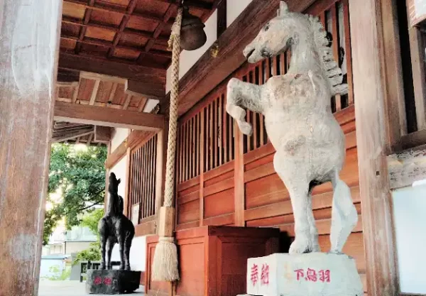 Horse-themed ema at Tanaka Jinja (田中神社) in southern Kyoto, a hidden Shinto shrine near JRA Kyoto Racecourse